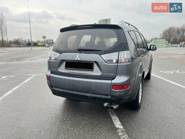 Серый Мицубиси Аутлендер ХЛ, объемом двигателя 2 л и пробегом 235 тыс. км за 4800 $, фото 10 на Automoto.ua