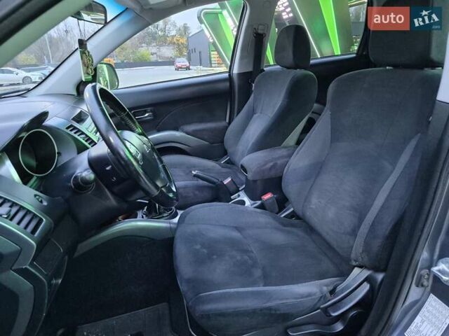 Серый Мицубиси Аутлендер ХЛ, объемом двигателя 2.2 л и пробегом 268 тыс. км за 8999 $, фото 45 на Automoto.ua