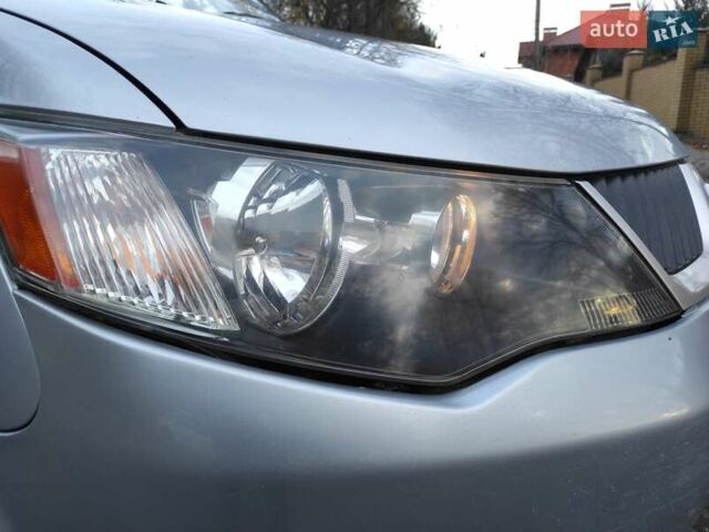 Серый Мицубиси Аутлендер ХЛ, объемом двигателя 2.4 л и пробегом 307 тыс. км за 8299 $, фото 23 на Automoto.ua