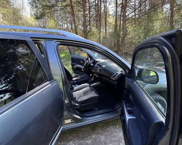 Серый Мицубиси Аутлендер ХЛ, объемом двигателя 2 л и пробегом 247 тыс. км за 5000 $, фото 7 на Automoto.ua