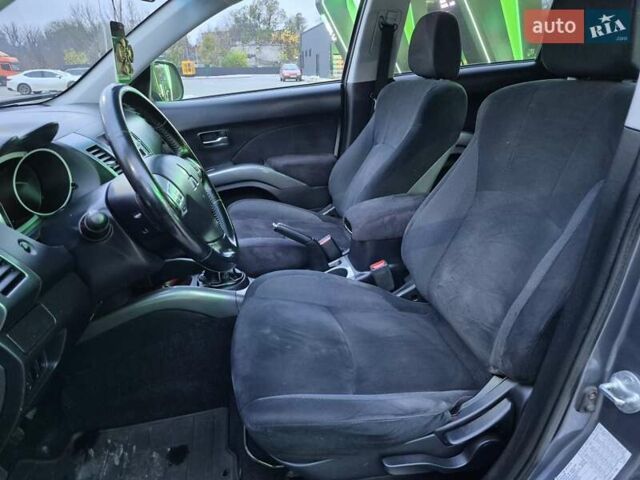 Серый Мицубиси Аутлендер ХЛ, объемом двигателя 2.2 л и пробегом 268 тыс. км за 8999 $, фото 46 на Automoto.ua