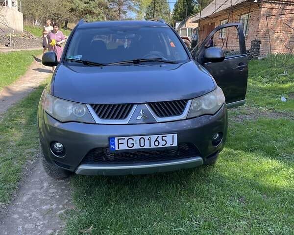 Серый Мицубиси Аутлендер ХЛ, объемом двигателя 2 л и пробегом 247 тыс. км за 5000 $, фото 8 на Automoto.ua