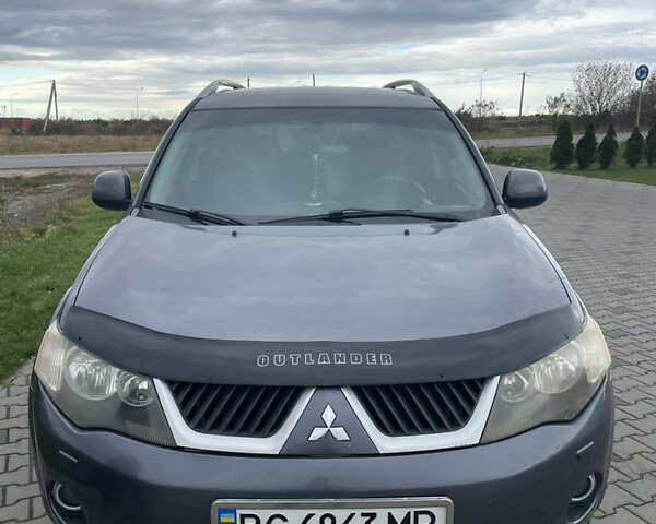 Серый Мицубиси Аутлендер ХЛ, объемом двигателя 3 л и пробегом 253 тыс. км за 8500 $, фото 7 на Automoto.ua