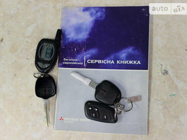 Сірий Міцубісі Аутлендер ХЛ, об'ємом двигуна 3 л та пробігом 244 тис. км за 8700 $, фото 37 на Automoto.ua