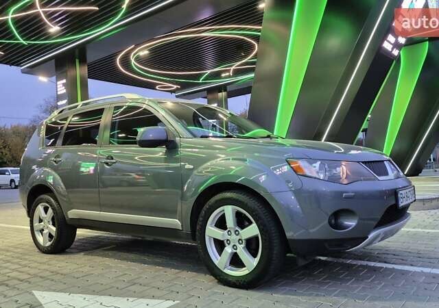 Серый Мицубиси Аутлендер ХЛ, объемом двигателя 2.2 л и пробегом 268 тыс. км за 8999 $, фото 92 на Automoto.ua