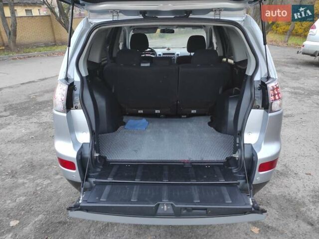 Сірий Міцубісі Аутлендер ХЛ, об'ємом двигуна 2.4 л та пробігом 307 тис. км за 8399 $, фото 39 на Automoto.ua