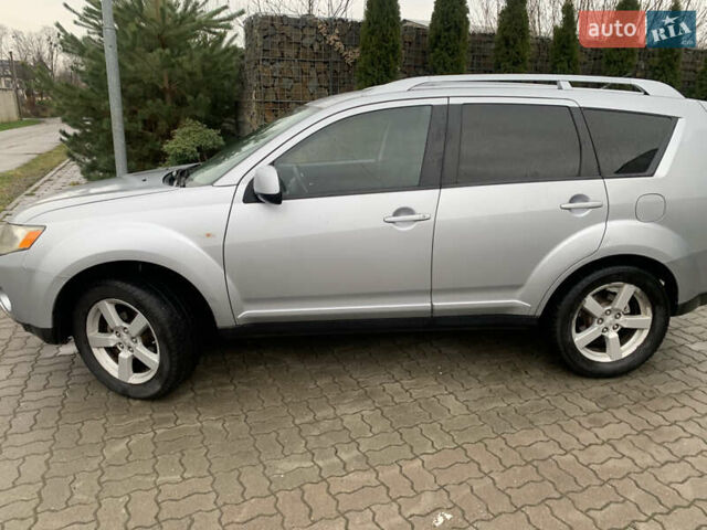 Сірий Міцубісі Аутлендер ХЛ, об'ємом двигуна 2 л та пробігом 310 тис. км за 6999 $, фото 4 на Automoto.ua
