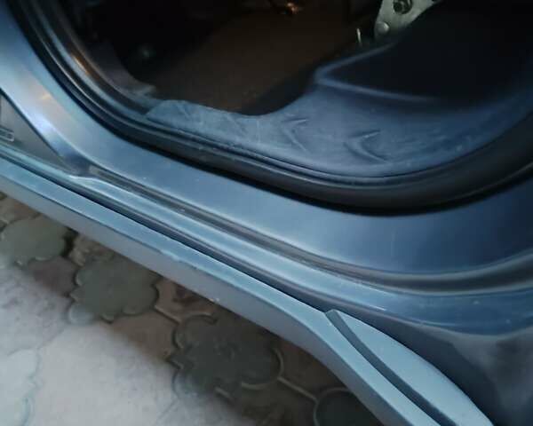 Серый Мицубиси Аутлендер ХЛ, объемом двигателя 2.36 л и пробегом 350 тыс. км за 8800 $, фото 29 на Automoto.ua