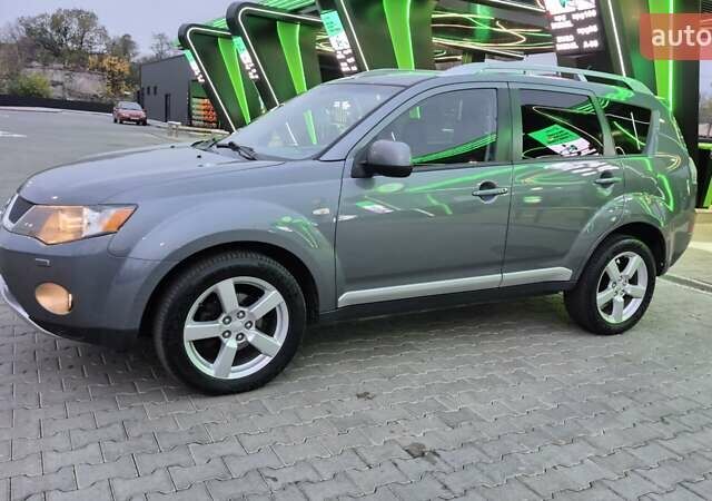 Серый Мицубиси Аутлендер ХЛ, объемом двигателя 2.2 л и пробегом 268 тыс. км за 8999 $, фото 22 на Automoto.ua