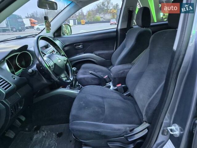 Серый Мицубиси Аутлендер ХЛ, объемом двигателя 2.2 л и пробегом 268 тыс. км за 8999 $, фото 36 на Automoto.ua