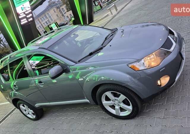 Серый Мицубиси Аутлендер ХЛ, объемом двигателя 2.2 л и пробегом 268 тыс. км за 8999 $, фото 25 на Automoto.ua