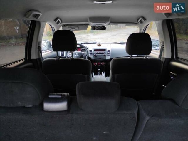 Серый Мицубиси Аутлендер ХЛ, объемом двигателя 2.4 л и пробегом 307 тыс. км за 8299 $, фото 41 на Automoto.ua