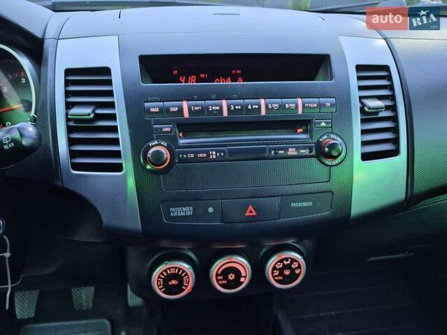 Серый Мицубиси Аутлендер ХЛ, объемом двигателя 2.2 л и пробегом 268 тыс. км за 8999 $, фото 40 на Automoto.ua