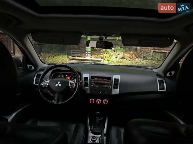 Серый Мицубиси Аутлендер ХЛ, объемом двигателя 3 л и пробегом 129 тыс. км за 10450 $, фото 29 на Automoto.ua