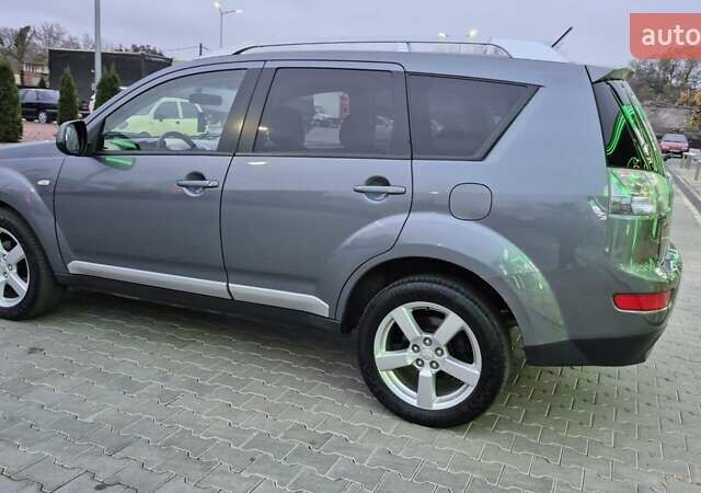 Серый Мицубиси Аутлендер ХЛ, объемом двигателя 2.2 л и пробегом 268 тыс. км за 8999 $, фото 17 на Automoto.ua