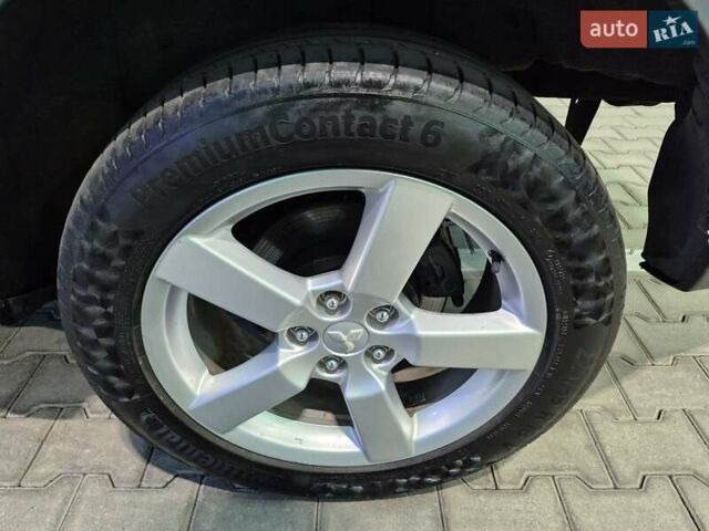 Серый Мицубиси Аутлендер ХЛ, объемом двигателя 2.2 л и пробегом 268 тыс. км за 8999 $, фото 65 на Automoto.ua