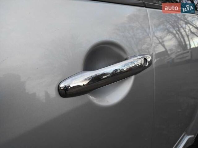 Серый Мицубиси Аутлендер ХЛ, объемом двигателя 2.4 л и пробегом 307 тыс. км за 8299 $, фото 12 на Automoto.ua