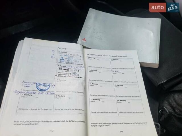 Серый Мицубиси Аутлендер ХЛ, объемом двигателя 2 л и пробегом 279 тыс. км за 8500 $, фото 26 на Automoto.ua