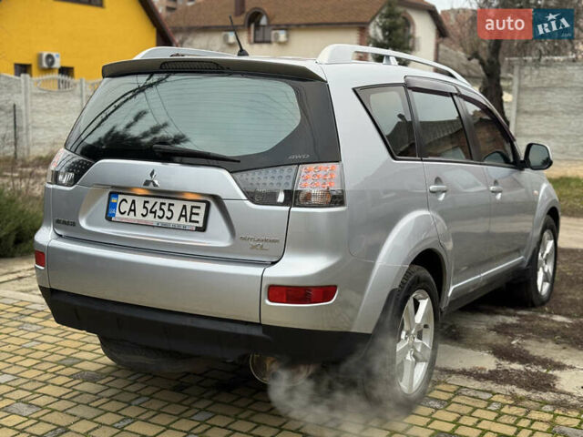 Серый Мицубиси Аутлендер ХЛ, объемом двигателя 2.4 л и пробегом 241 тыс. км за 7350 $, фото 5 на Automoto.ua