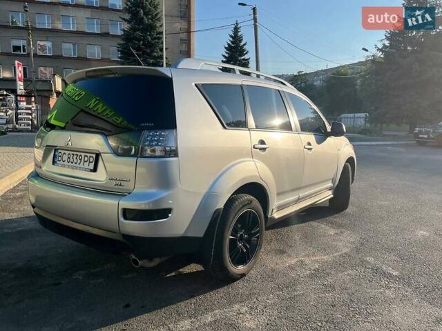 Серый Мицубиси Аутлендер ХЛ, объемом двигателя 2.4 л и пробегом 262 тыс. км за 8800 $, фото 6 на Automoto.ua