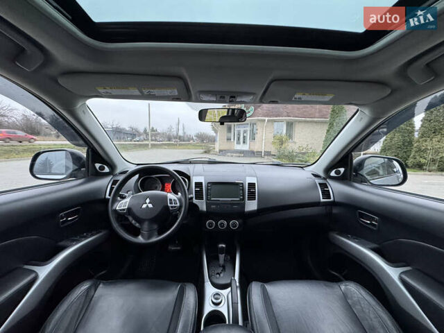 Серый Мицубиси Аутлендер ХЛ, объемом двигателя 3 л и пробегом 195 тыс. км за 10300 $, фото 14 на Automoto.ua