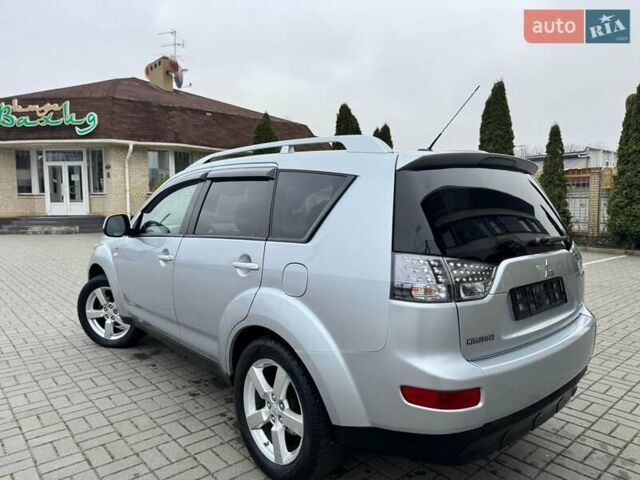 Серый Мицубиси Аутлендер ХЛ, объемом двигателя 3 л и пробегом 195 тыс. км за 10300 $, фото 28 на Automoto.ua