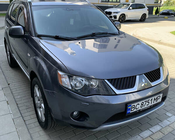 Сірий Міцубісі Аутлендер ХЛ, об'ємом двигуна 2.4 л та пробігом 217 тис. км за 9000 $, фото 1 на Automoto.ua