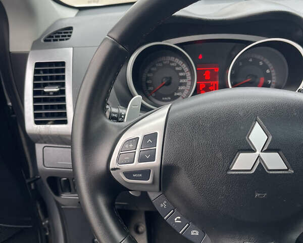 Серый Мицубиси Аутлендер ХЛ, объемом двигателя 2.36 л и пробегом 184 тыс. км за 8500 $, фото 11 на Automoto.ua