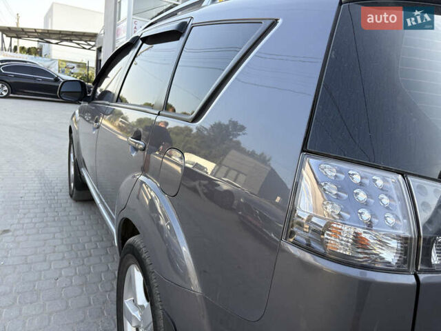 Міцубісі Аутлендер ХЛ 2008 у Києві на Automoto.ua Сірий Міцубісі Аутлендер ХЛ, об'ємом двигуна 2.36 л та пробігом 215 тис. км за 9000 $, фото 7 на Automoto.ua