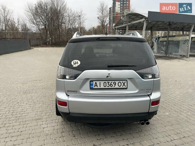 Серый Мицубиси Аутлендер ХЛ, объемом двигателя 2.36 л и пробегом 184 тыс. км за 8500 $, фото 4 на Automoto.ua