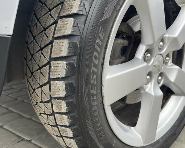 Серый Мицубиси Аутлендер ХЛ, объемом двигателя 2.36 л и пробегом 184 тыс. км за 8500 $, фото 7 на Automoto.ua