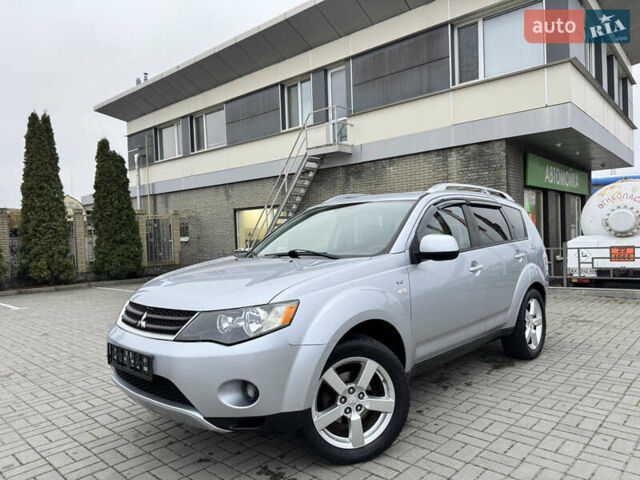 Серый Мицубиси Аутлендер ХЛ, объемом двигателя 3 л и пробегом 195 тыс. км за 10300 $, фото 29 на Automoto.ua