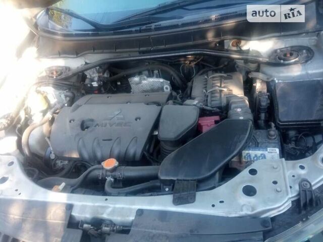 Серый Мицубиси Аутлендер ХЛ, объемом двигателя 2.36 л и пробегом 248 тыс. км за 7100 $, фото 8 на Automoto.ua