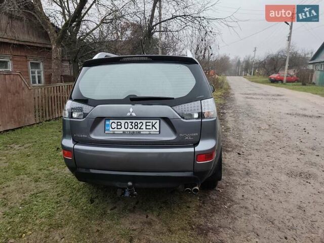 Серый Мицубиси Аутлендер ХЛ, объемом двигателя 2.98 л и пробегом 290 тыс. км за 7000 $, фото 5 на Automoto.ua