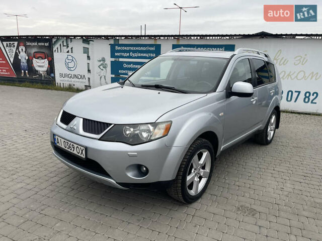 Серый Мицубиси Аутлендер ХЛ, объемом двигателя 2.36 л и пробегом 184 тыс. км за 8500 $, фото 2 на Automoto.ua