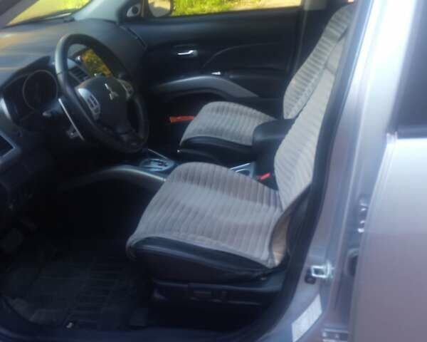 Серый Мицубиси Аутлендер ХЛ, объемом двигателя 2.36 л и пробегом 248 тыс. км за 7100 $, фото 5 на Automoto.ua