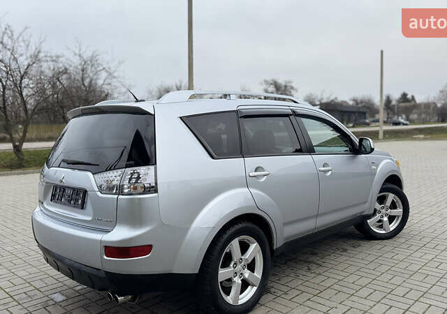 Серый Мицубиси Аутлендер ХЛ, объемом двигателя 3 л и пробегом 195 тыс. км за 10300 $, фото 31 на Automoto.ua