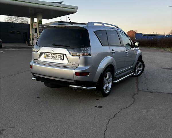 Серый Мицубиси Аутлендер ХЛ, объемом двигателя 2.36 л и пробегом 177 тыс. км за 8750 $, фото 14 на Automoto.ua