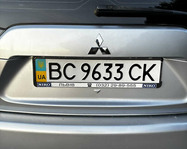 Серый Мицубиси Аутлендер ХЛ, объемом двигателя 2.36 л и пробегом 177 тыс. км за 8750 $, фото 8 на Automoto.ua