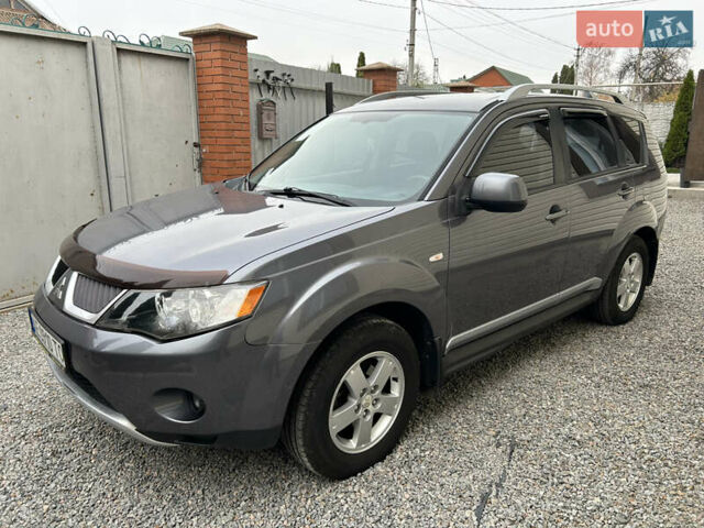 Серый Мицубиси Аутлендер ХЛ, объемом двигателя 2.36 л и пробегом 153 тыс. км за 11500 $, фото 5 на Automoto.ua