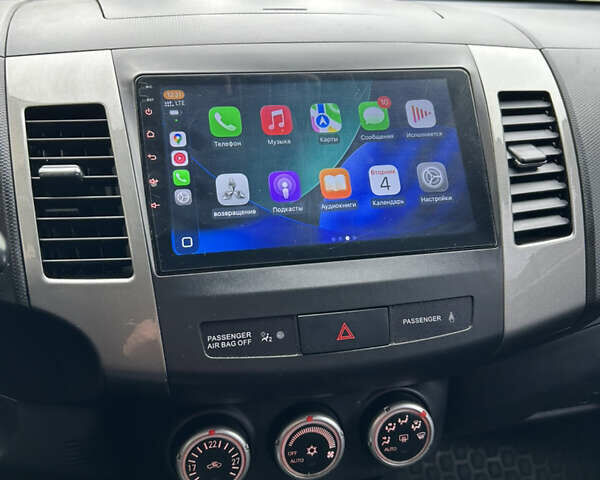 Серый Мицубиси Аутлендер ХЛ, объемом двигателя 2.36 л и пробегом 153 тыс. км за 11500 $, фото 7 на Automoto.ua