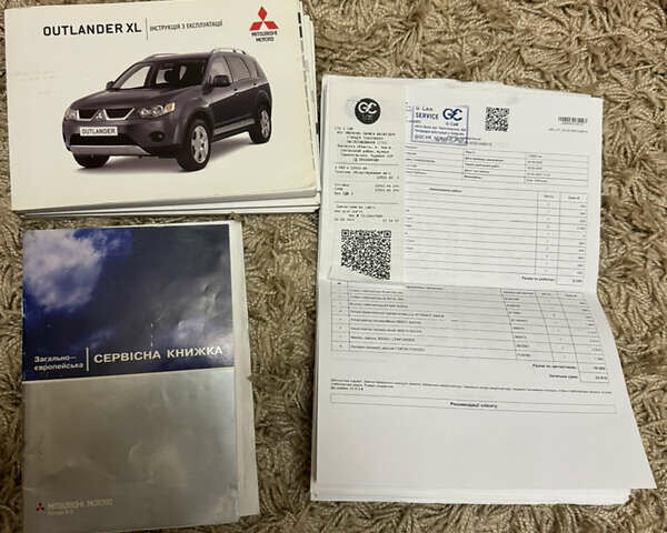 Сірий Міцубісі Аутлендер ХЛ, об'ємом двигуна 3 л та пробігом 132 тис. км за 9600 $, фото 28 на Automoto.ua