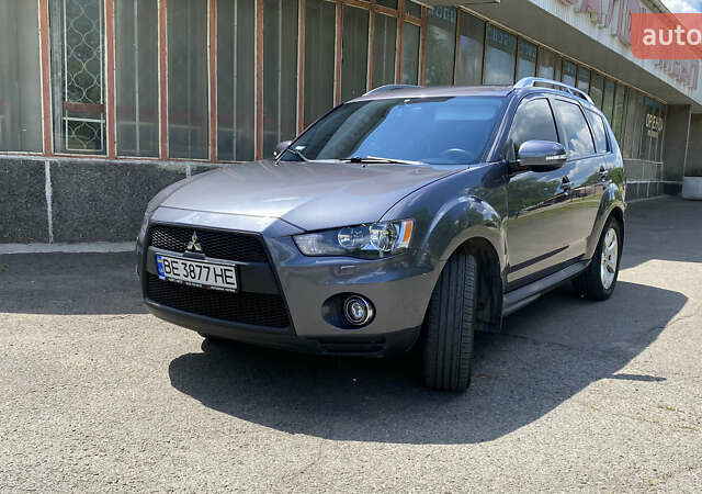 Сірий Міцубісі Аутлендер ХЛ, об'ємом двигуна 2.4 л та пробігом 126 тис. км за 11200 $, фото 1 на Automoto.ua
