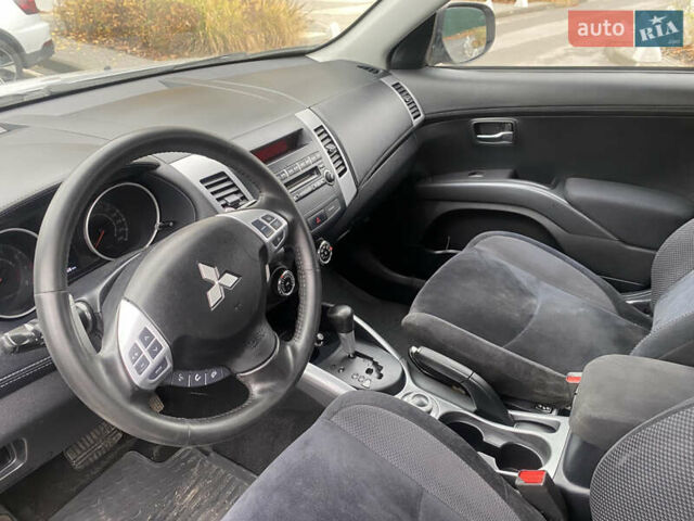 Серый Мицубиси Аутлендер ХЛ, объемом двигателя 2.4 л и пробегом 182 тыс. км за 9800 $, фото 19 на Automoto.ua