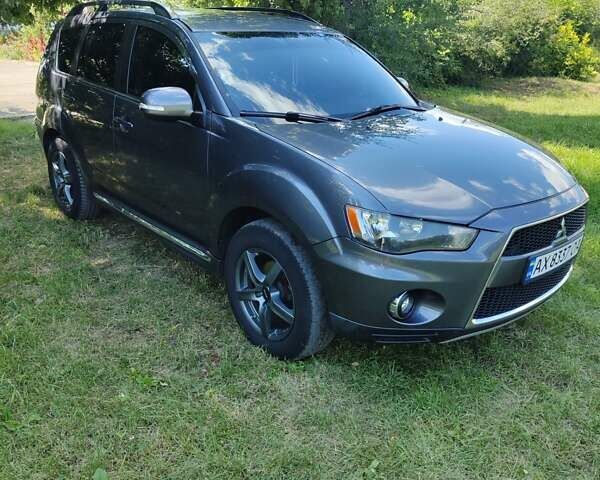 Серый Мицубиси Аутлендер ХЛ, объемом двигателя 2.36 л и пробегом 235 тыс. км за 10800 $, фото 8 на Automoto.ua