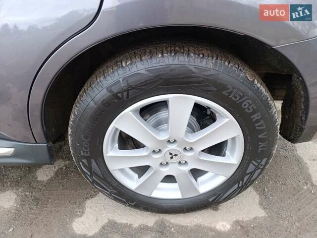 Серый Мицубиси Аутлендер ХЛ, объемом двигателя 2.3 л и пробегом 289 тыс. км за 10333 $, фото 43 на Automoto.ua