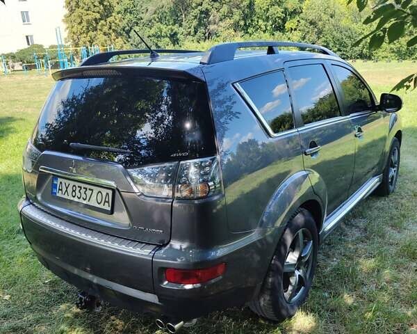 Серый Мицубиси Аутлендер ХЛ, объемом двигателя 2.36 л и пробегом 235 тыс. км за 10800 $, фото 6 на Automoto.ua