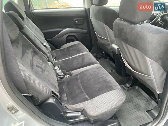 Серый Мицубиси Аутлендер ХЛ, объемом двигателя 2.4 л и пробегом 182 тыс. км за 9800 $, фото 13 на Automoto.ua