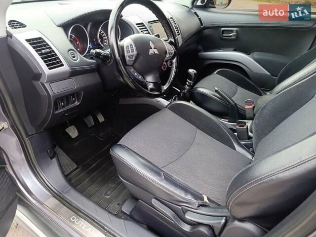 Серый Мицубиси Аутлендер ХЛ, объемом двигателя 2.3 л и пробегом 289 тыс. км за 10333 $, фото 17 на Automoto.ua