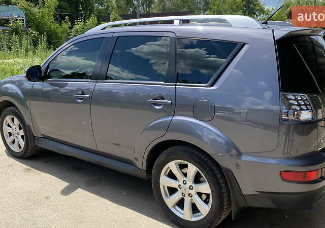 Сірий Міцубісі Аутлендер ХЛ, об'ємом двигуна 2.4 л та пробігом 126 тис. км за 11200 $, фото 30 на Automoto.ua